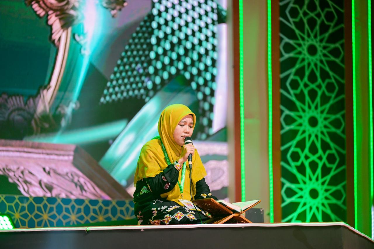 Suara dari Langit Bengkalis: Noprianti Persembahkan Tilawah Terbaik MTQ Riau